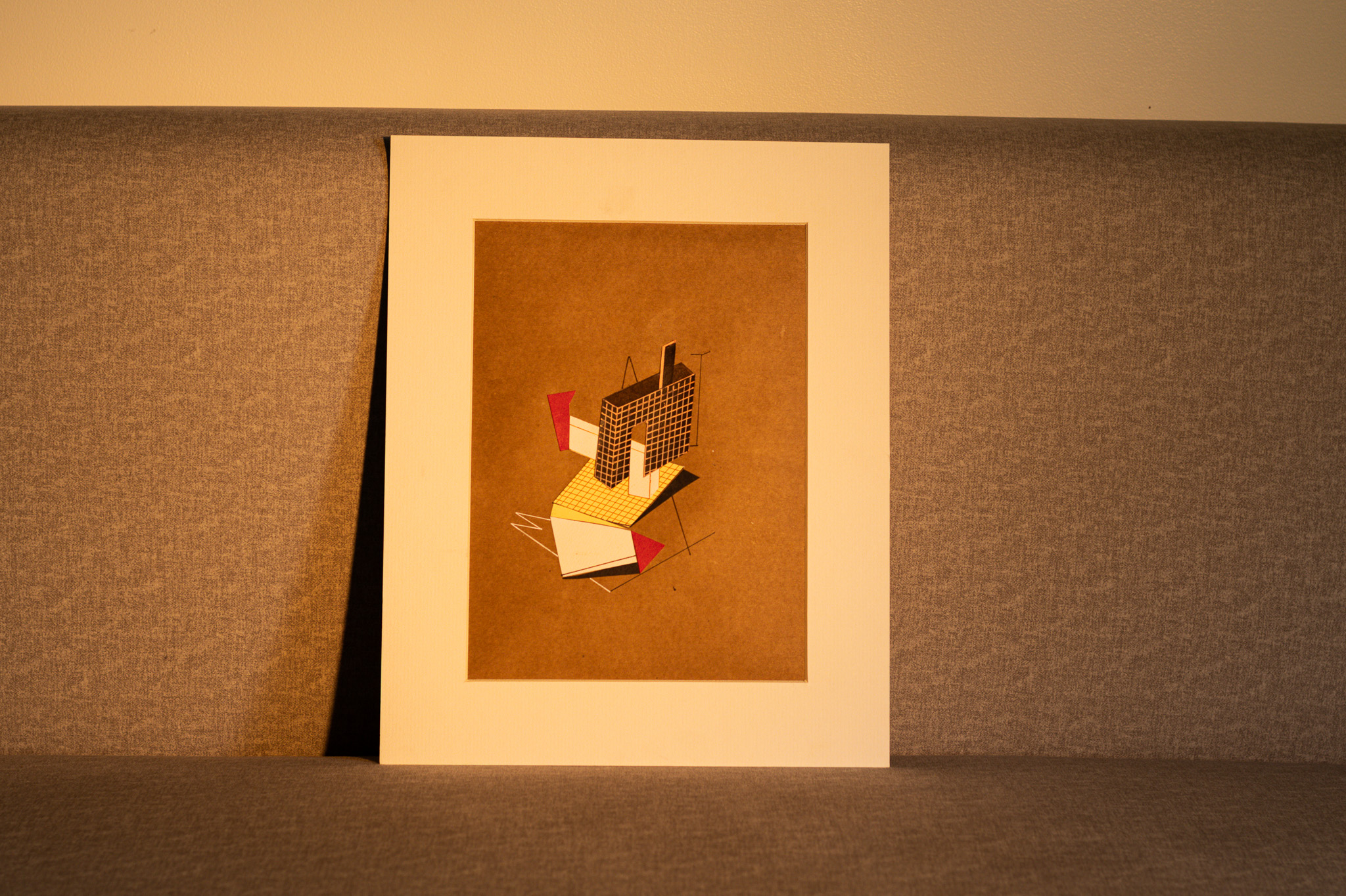 Framed paper composition with red and cream forms