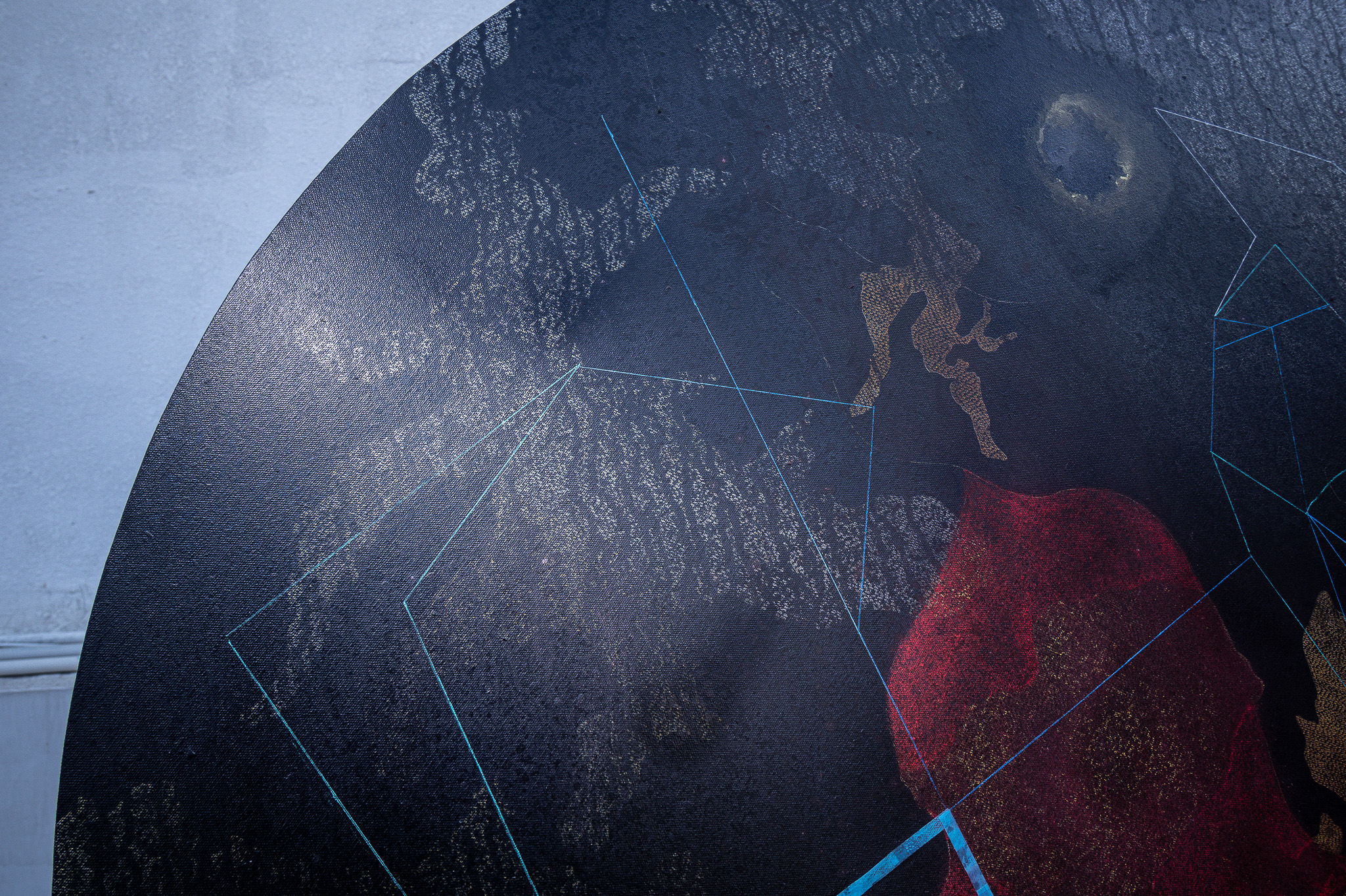 Charcoal and red circular work — additional view 1